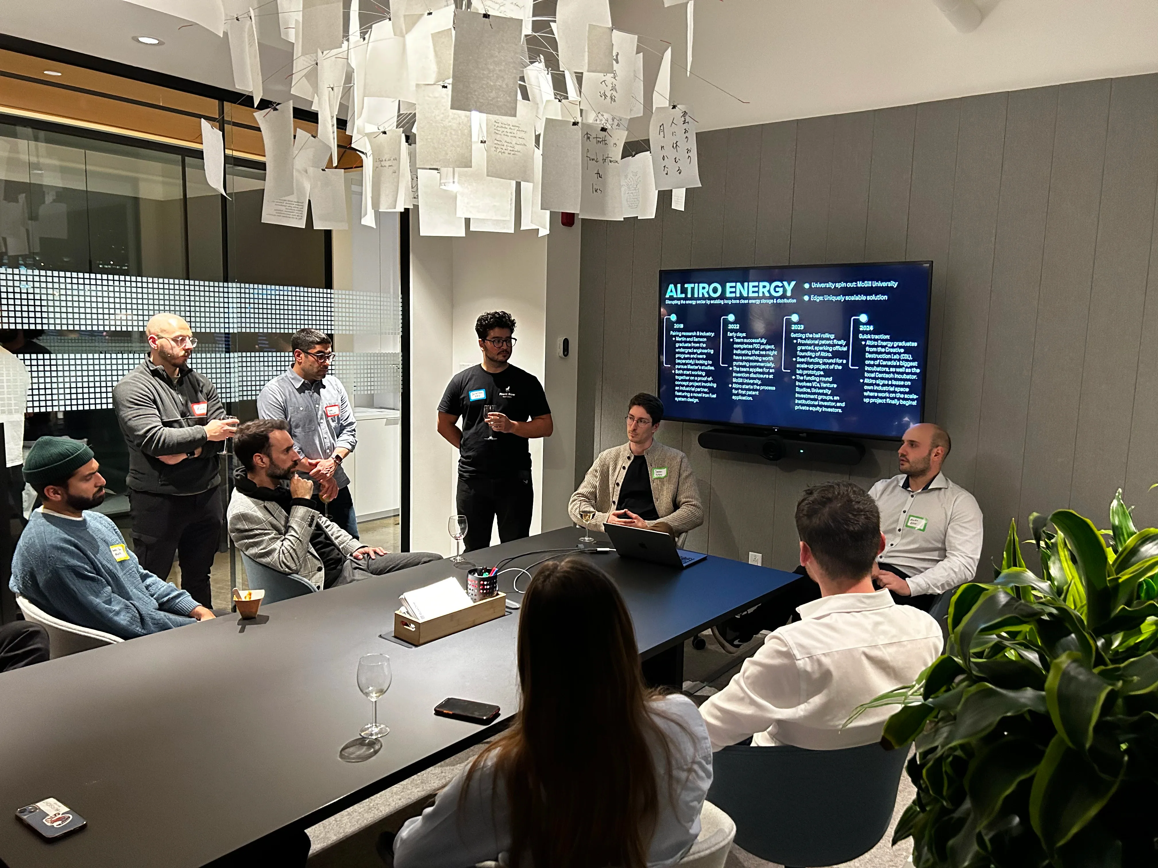 Founders and guests discuss their startup at a Grad Connect event.